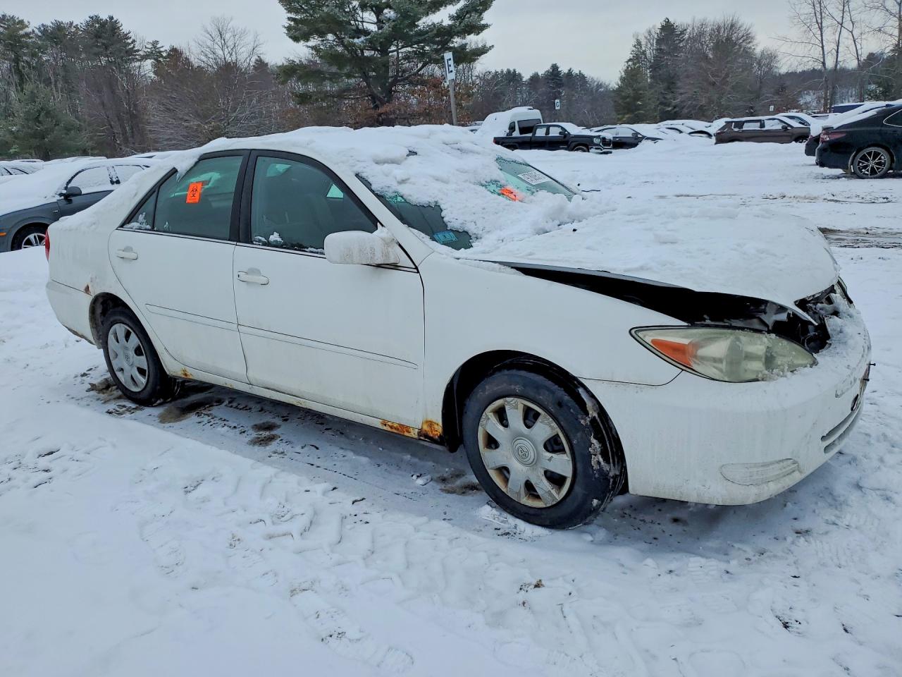 2004 TOYOTA CAMRY LE photo 4