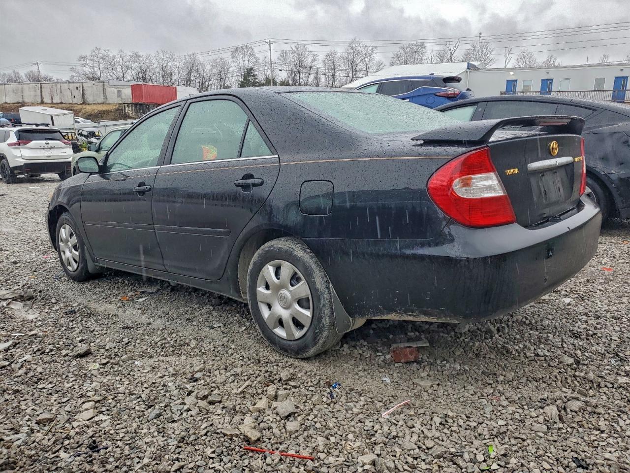 2004 TOYOTA CAMRY LE photo 4