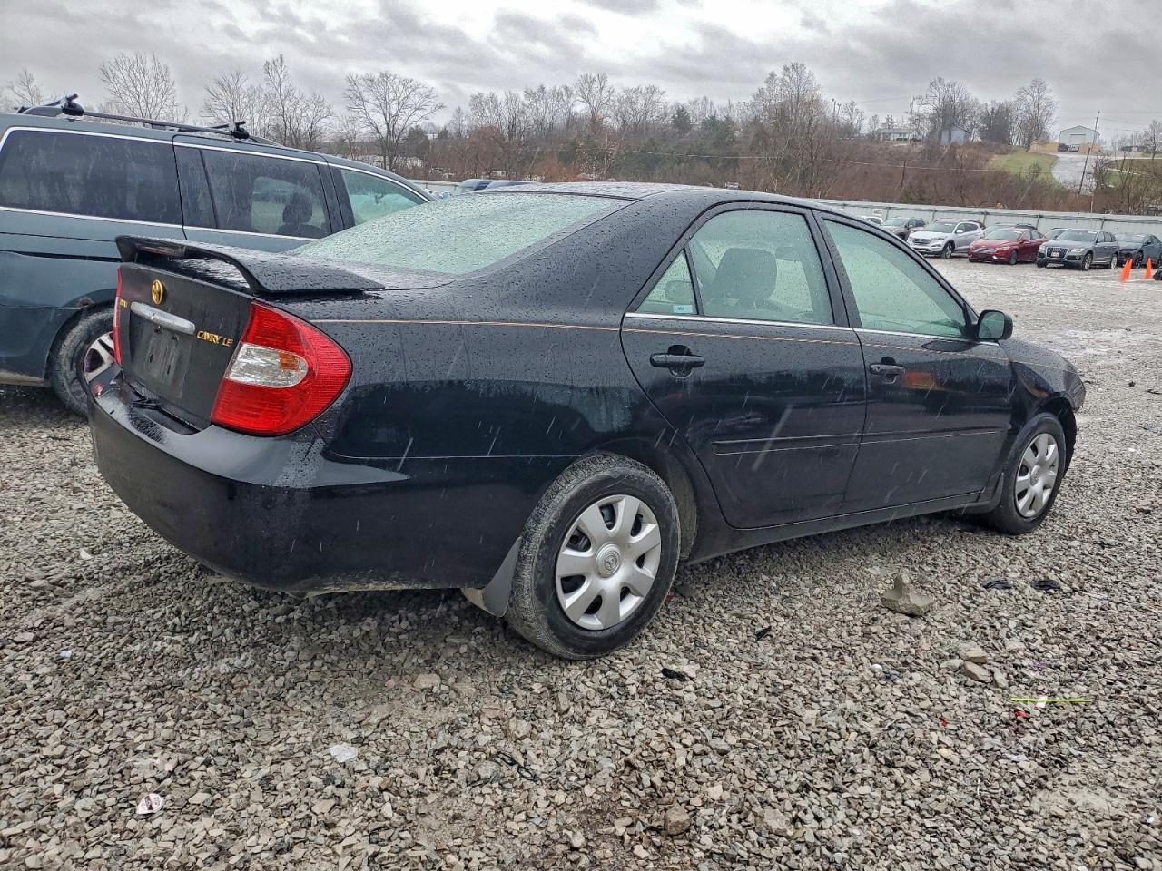 2004 TOYOTA CAMRY LE photo 7