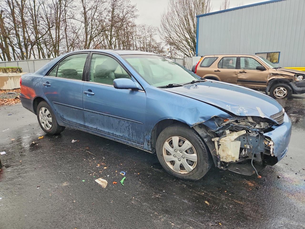 2004 TOYOTA CAMRY LE photo 4