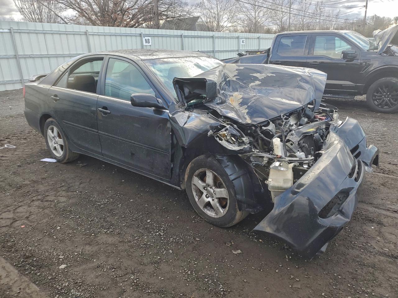 2004 TOYOTA CAMRY SE photo 4