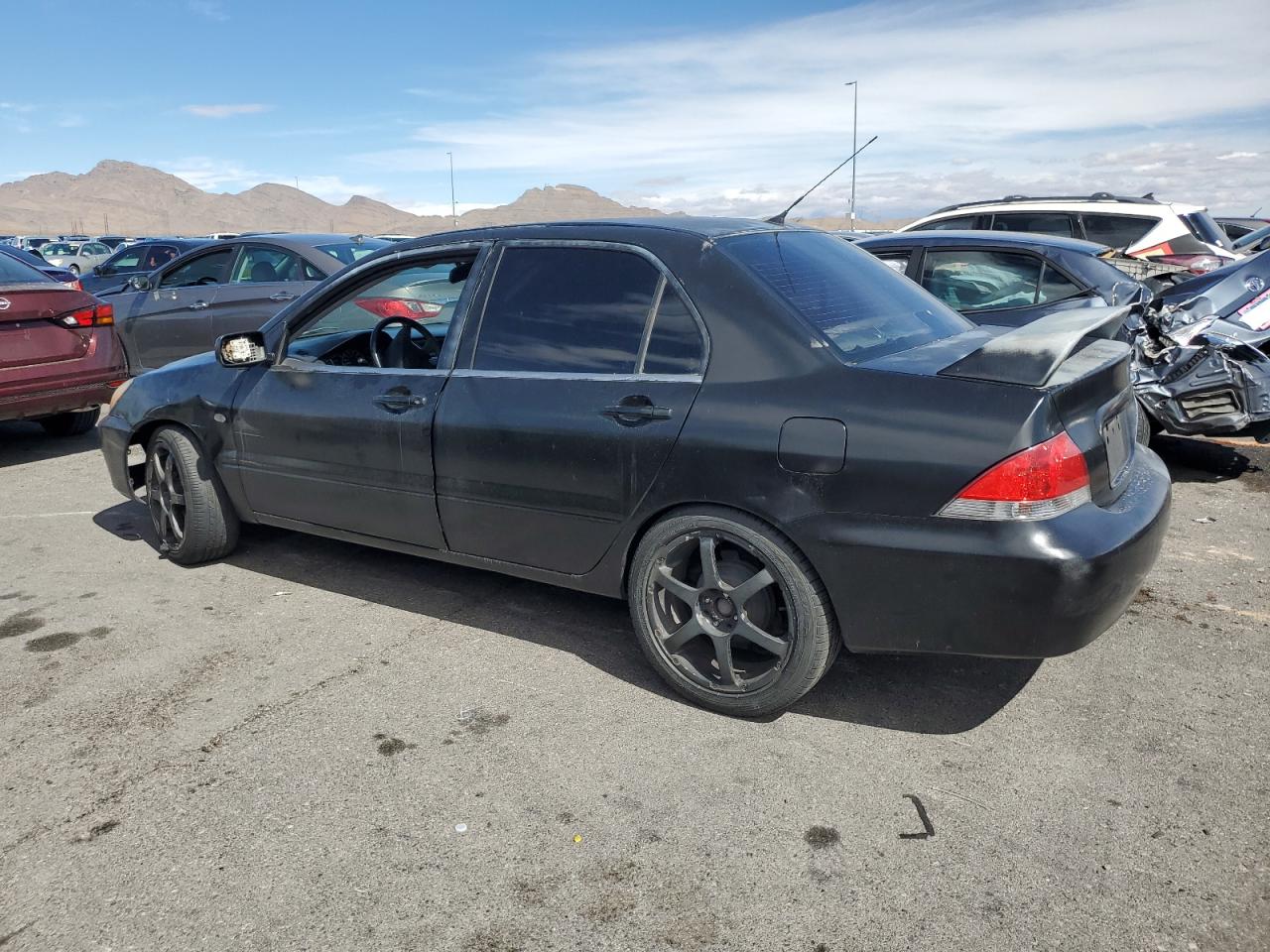 2004 MITSUBISHI LANCER photo 4