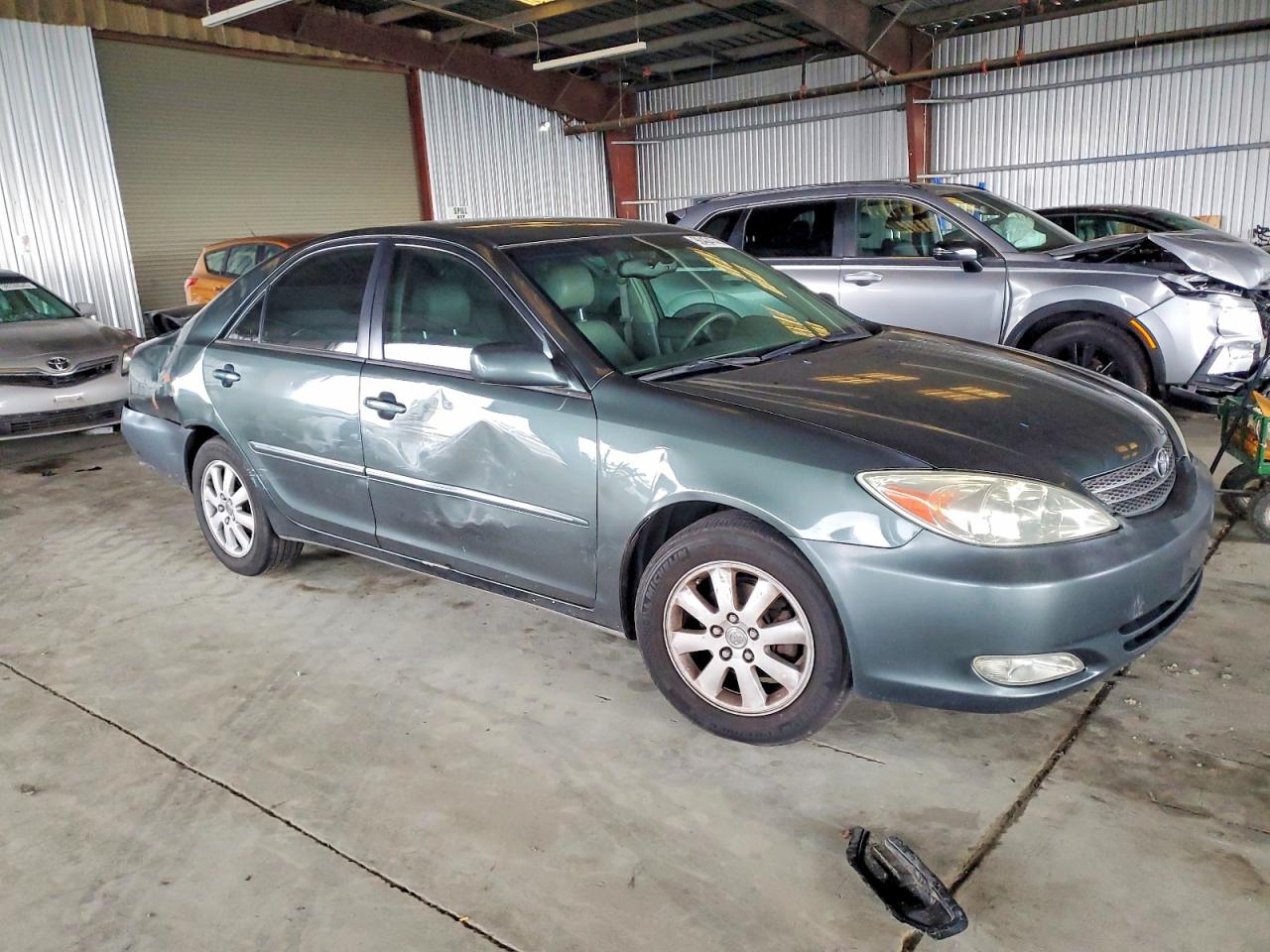 2004 TOYOTA CAMRY LE photo 4