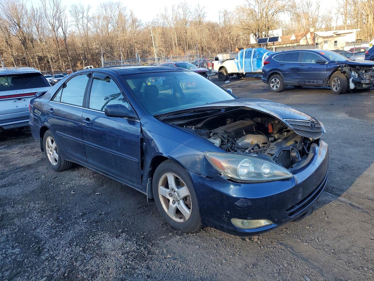 2004 TOYOTA CAMRY LE photo 4