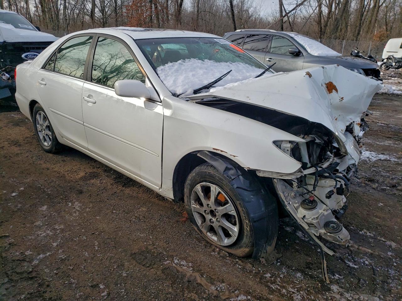 2004 TOYOTA CAMRY LE photo 7