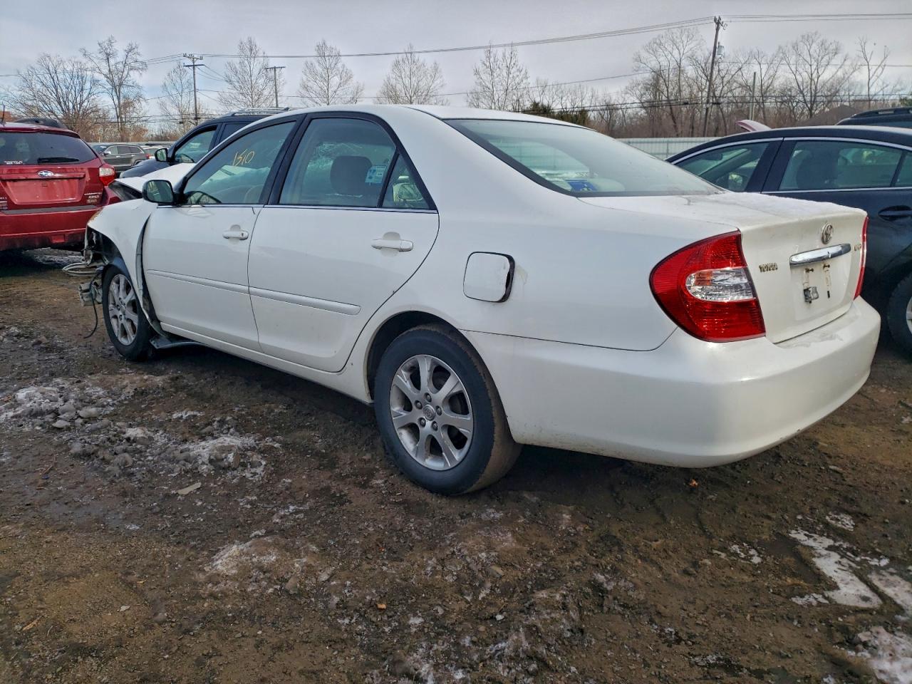 2004 TOYOTA CAMRY LE photo 3