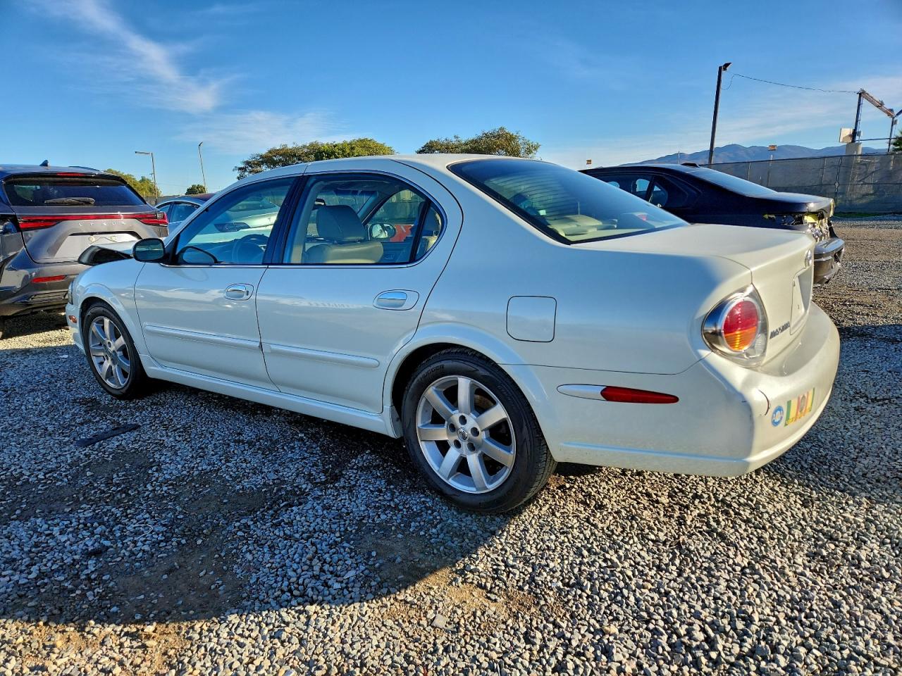 2003 NISSAN MAXIMA GLE photo 2