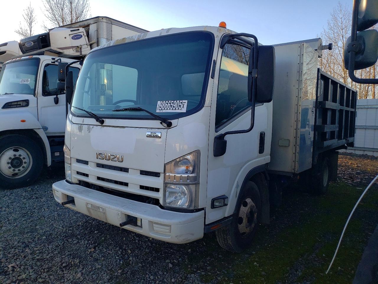 2011 ISUZU NPR HD DUMP TRUCK photo 2