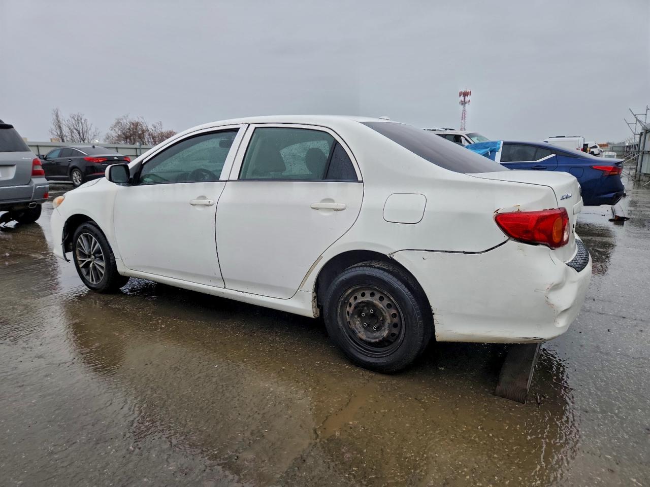 2010 TOYOTA COROLLA BASE photo 2