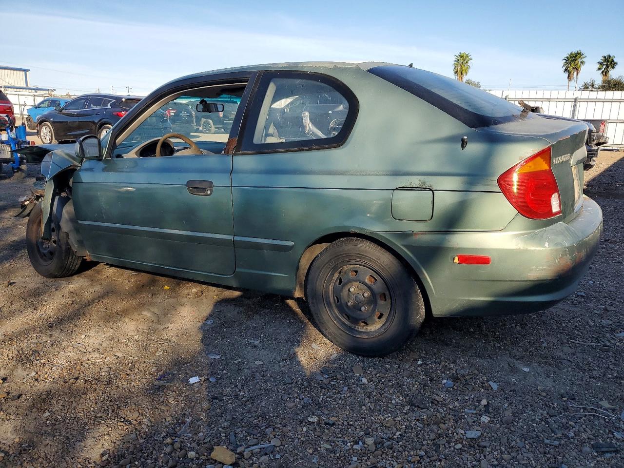 2005 HYUNDAI ACCENT GS photo 2