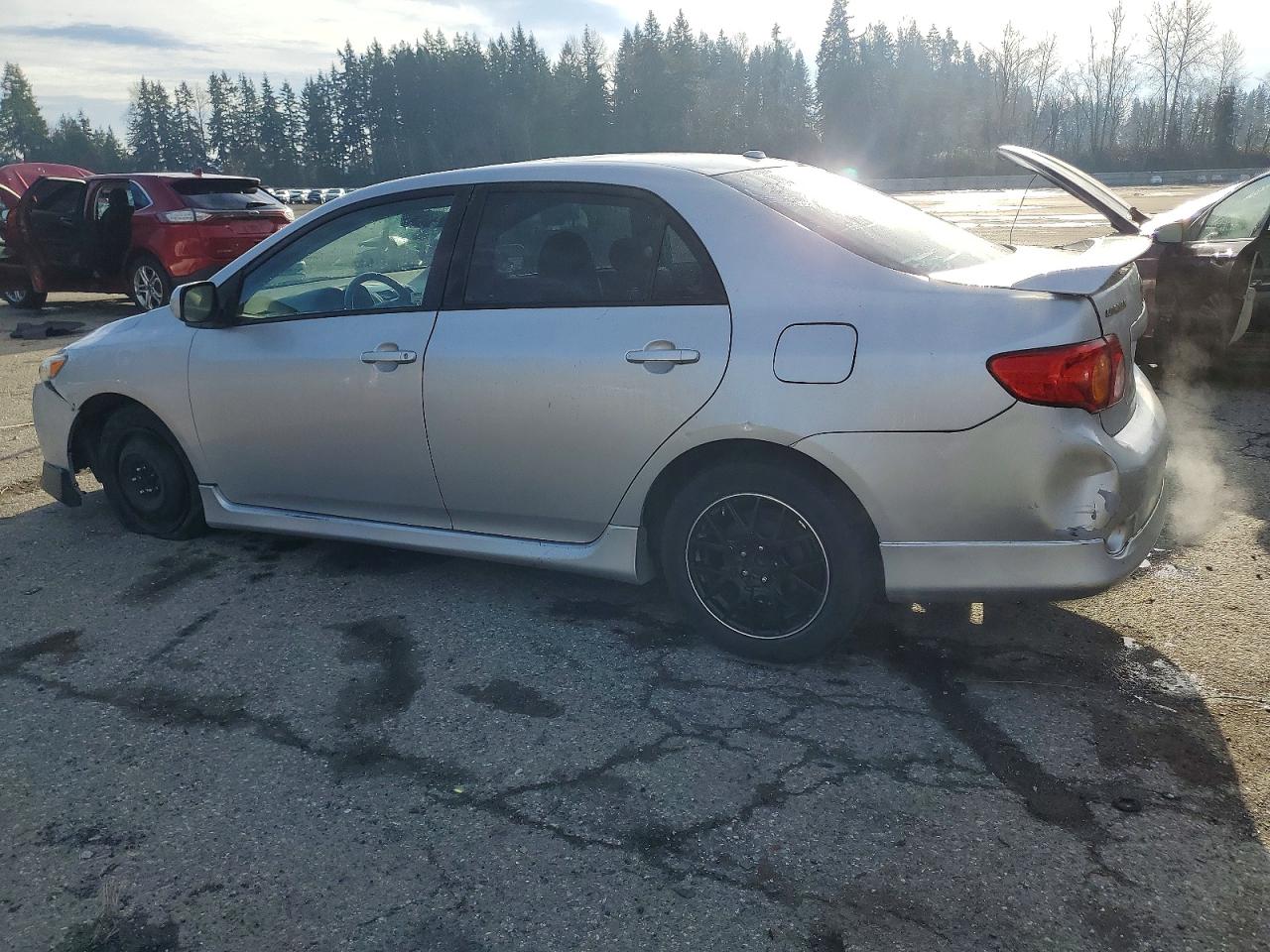 2010 TOYOTA COROLLA BASE photo 2