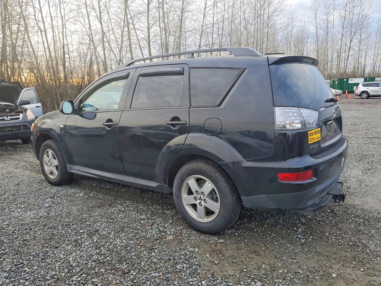 2010 MITSUBISHI OUTLANDER ES photo 2