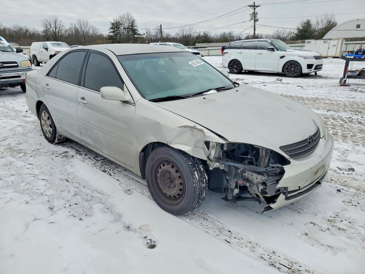 2004 TOYOTA CAMRY LE photo 4
