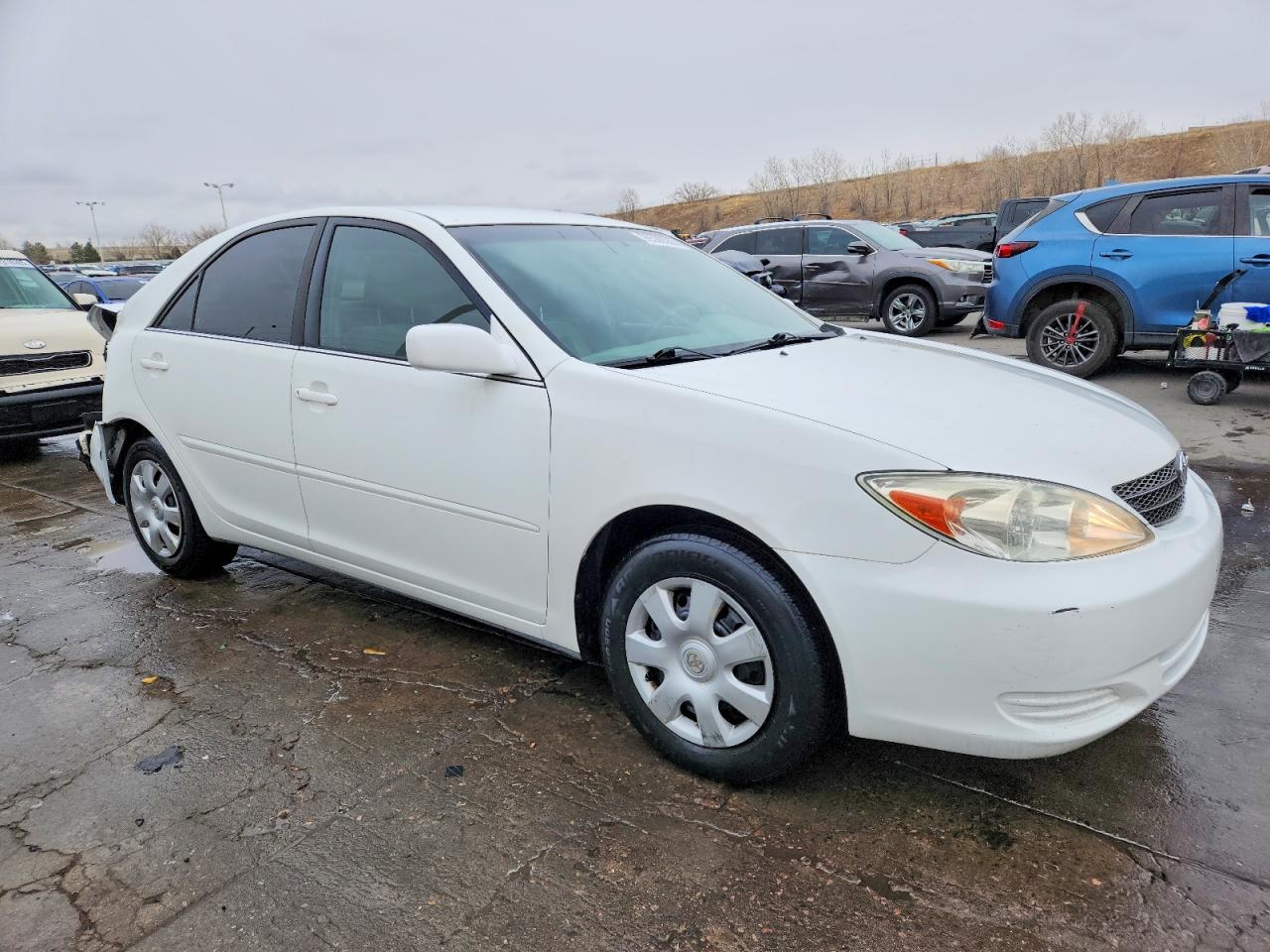 2004 TOYOTA CAMRY LE photo 4
