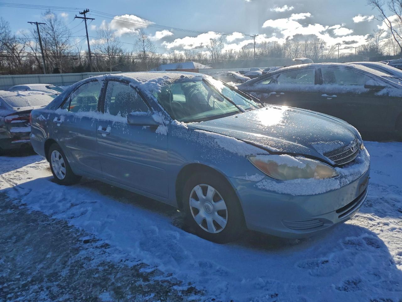 2004 TOYOTA CAMRY LE photo 4