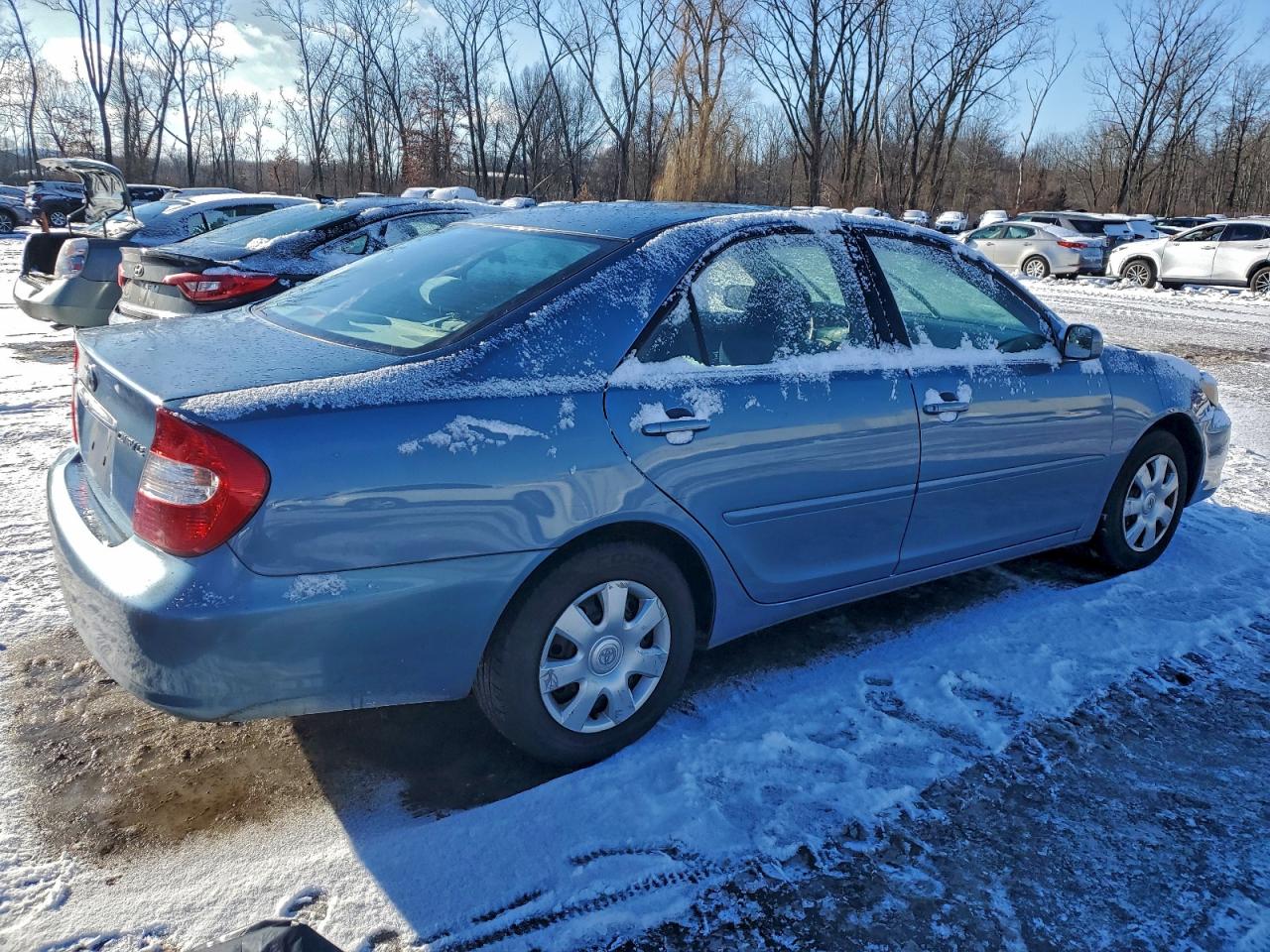 2004 TOYOTA CAMRY LE photo 3