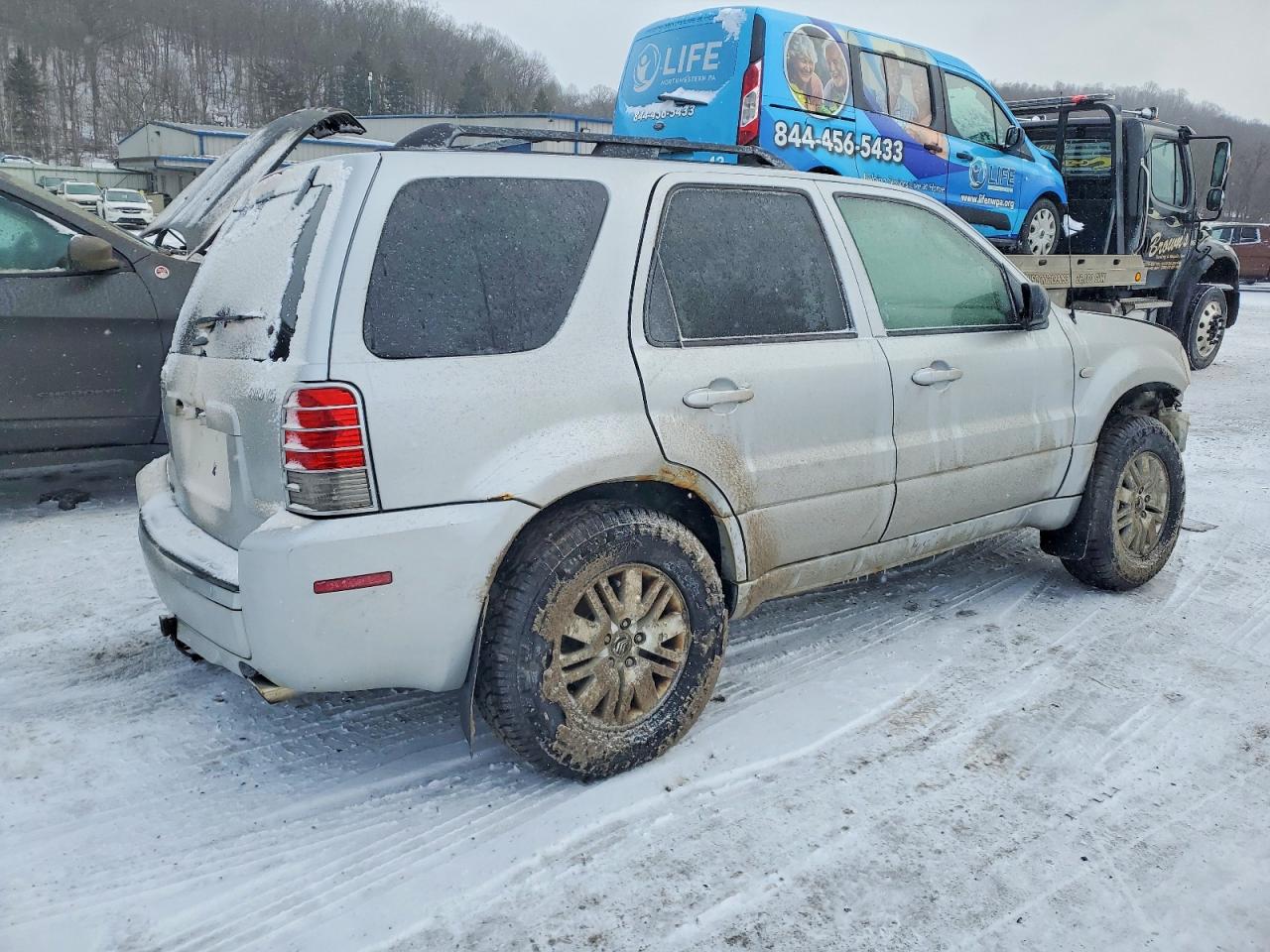 2005 MERC MARINER photo 3