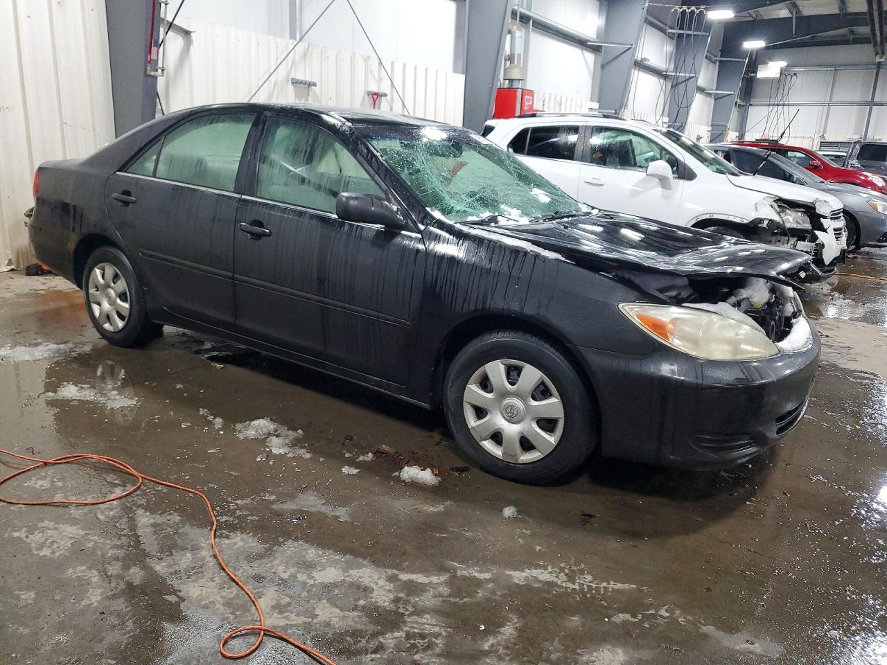 2004 TOYOTA CAMRY LE photo 4