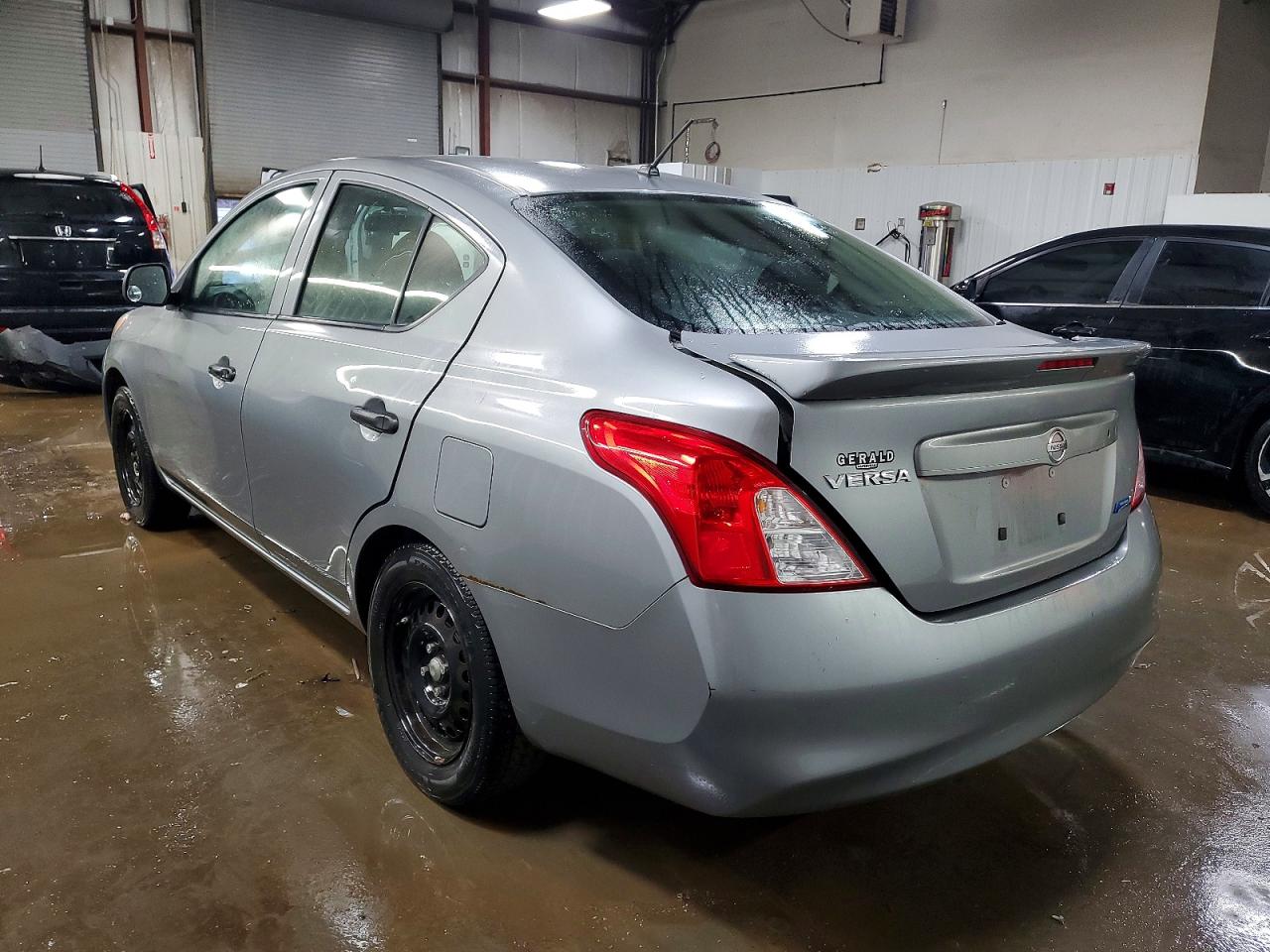 2014 NISSAN VERSA S photo 2