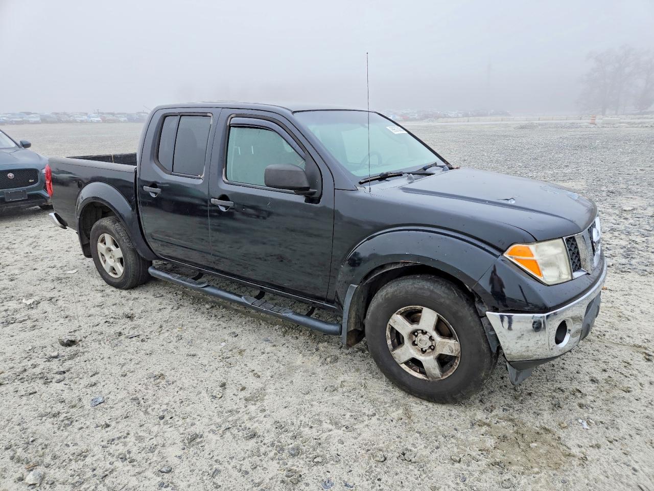 2005 NISSAN FRONTIER CREW CAB LE photo 4