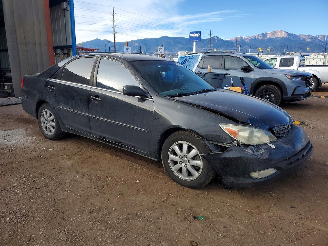 2004 TOYOTA CAMRY LE photo 4