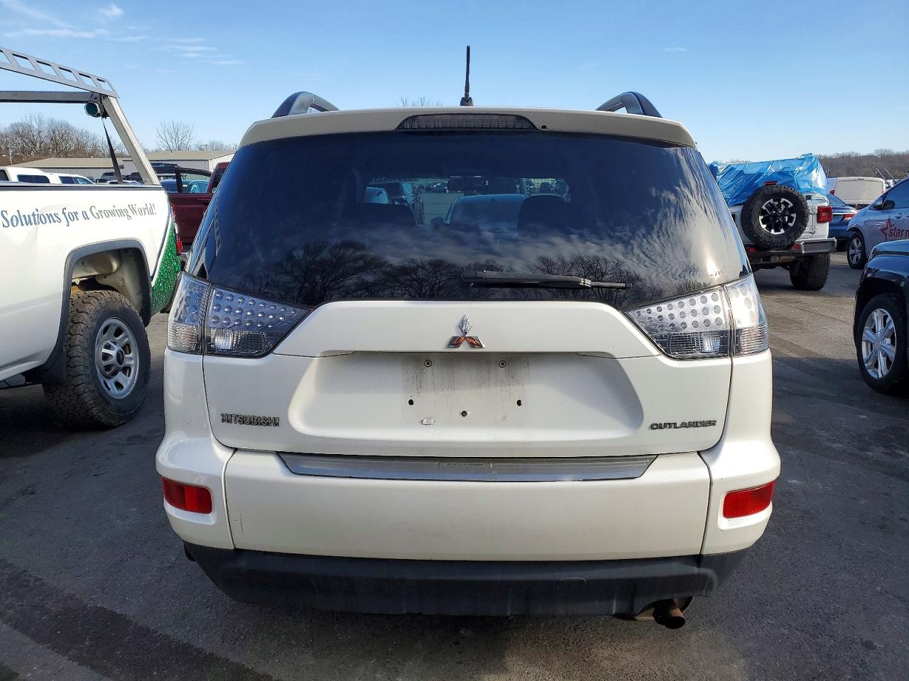 2010 MITSUBISHI OUTLANDER ES photo 6