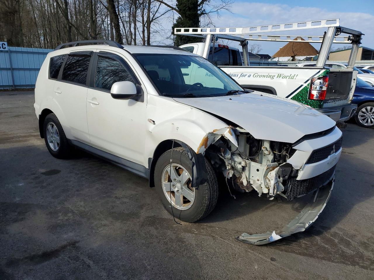 2010 MITSUBISHI OUTLANDER ES photo 4
