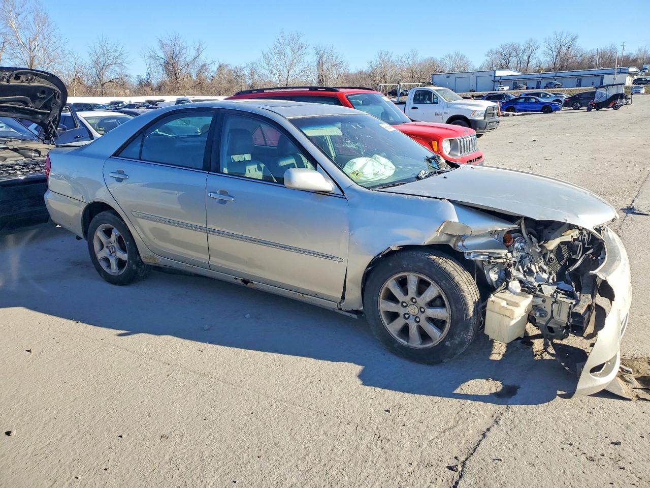 2004 TOYOTA CAMRY LE photo 4