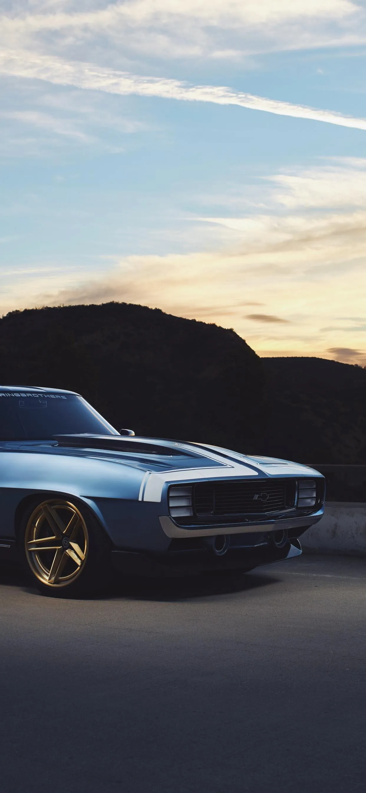 Classic Muscle Car on Road During Sunset Hour Wallpaper