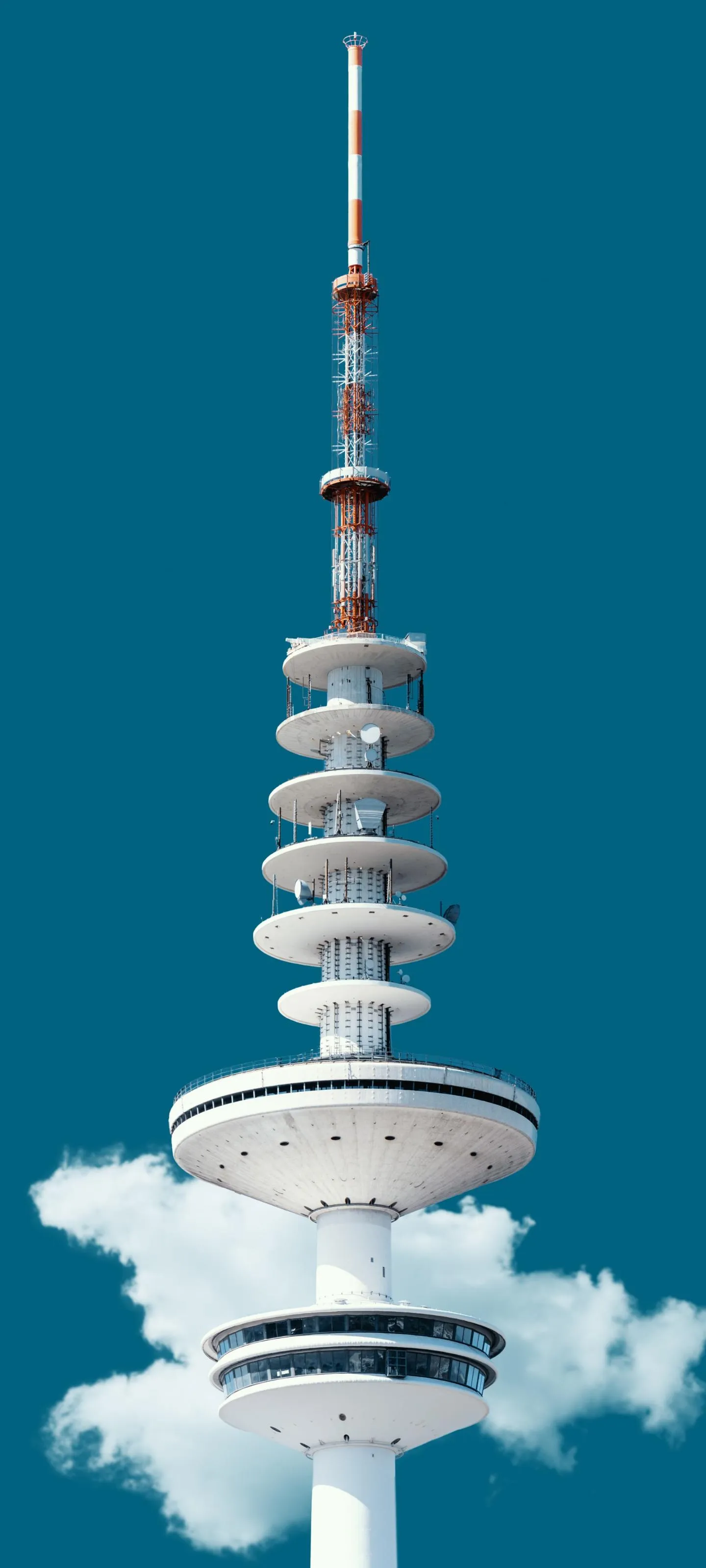 Modern White Tower Against a Clear Blue Sky Wallpaper