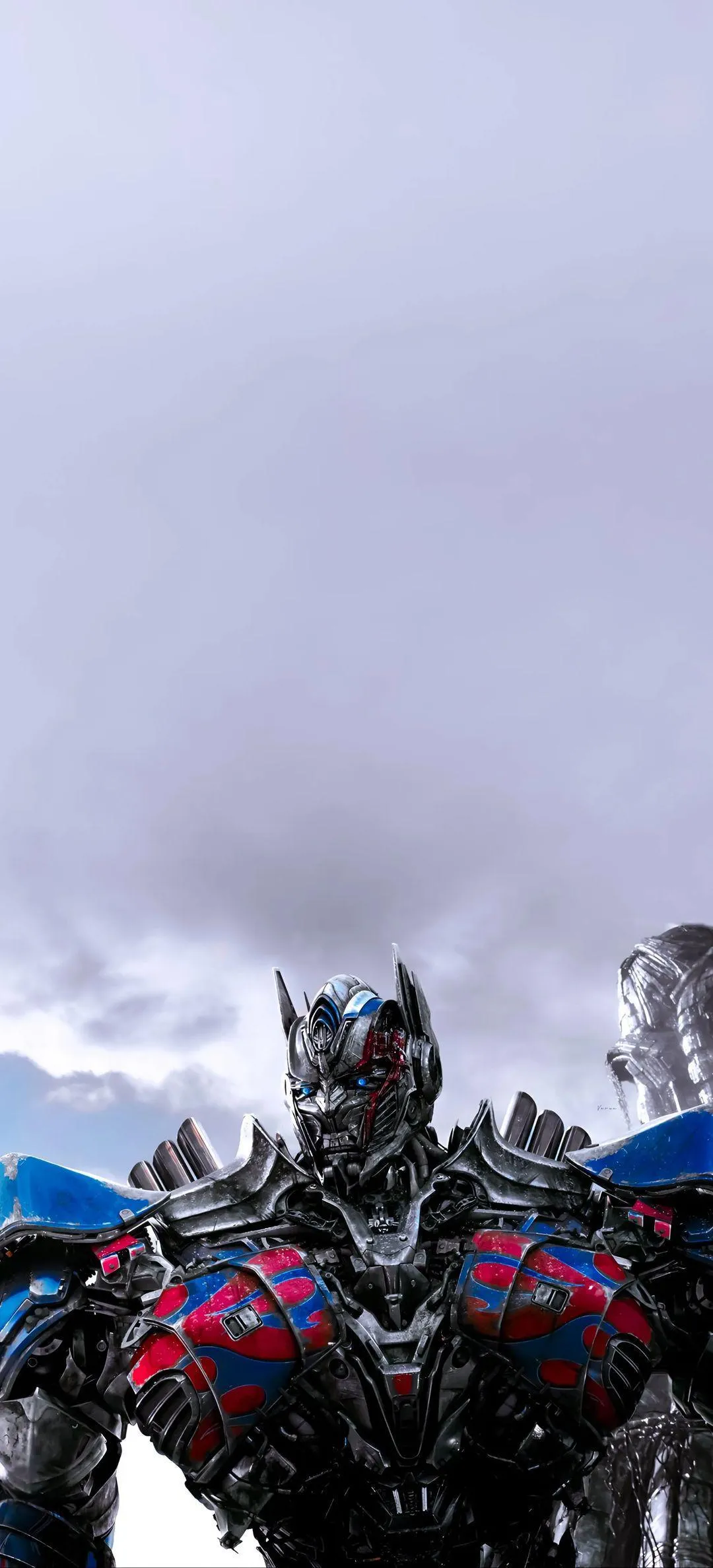 Optimus Prime Standing Strong in Battle Armor Wallpaper