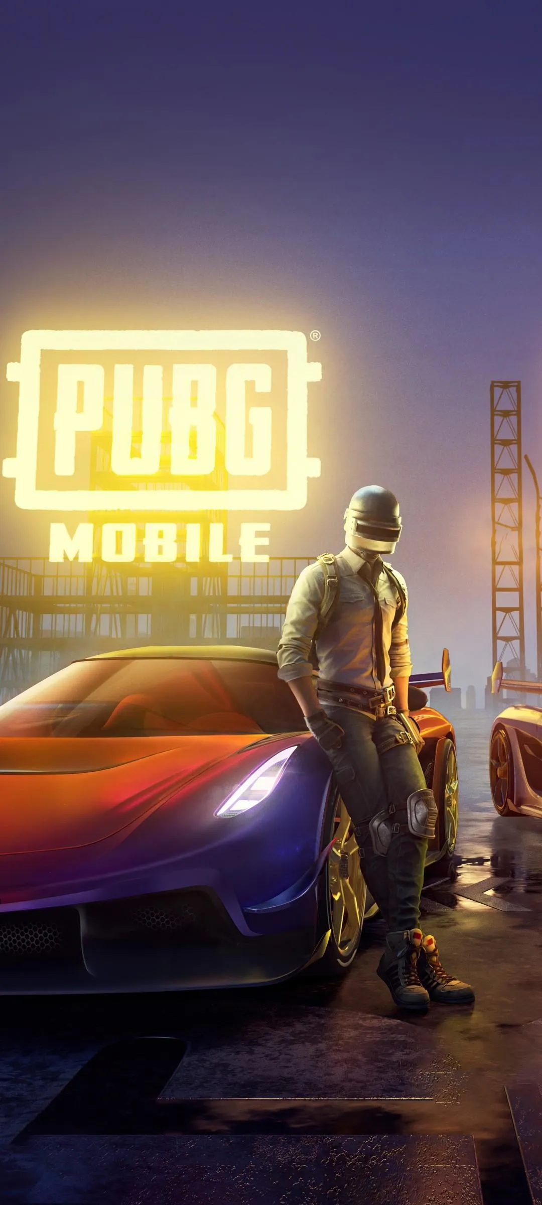 PUBG Character Standing Under City Neon Lights Wallpaper