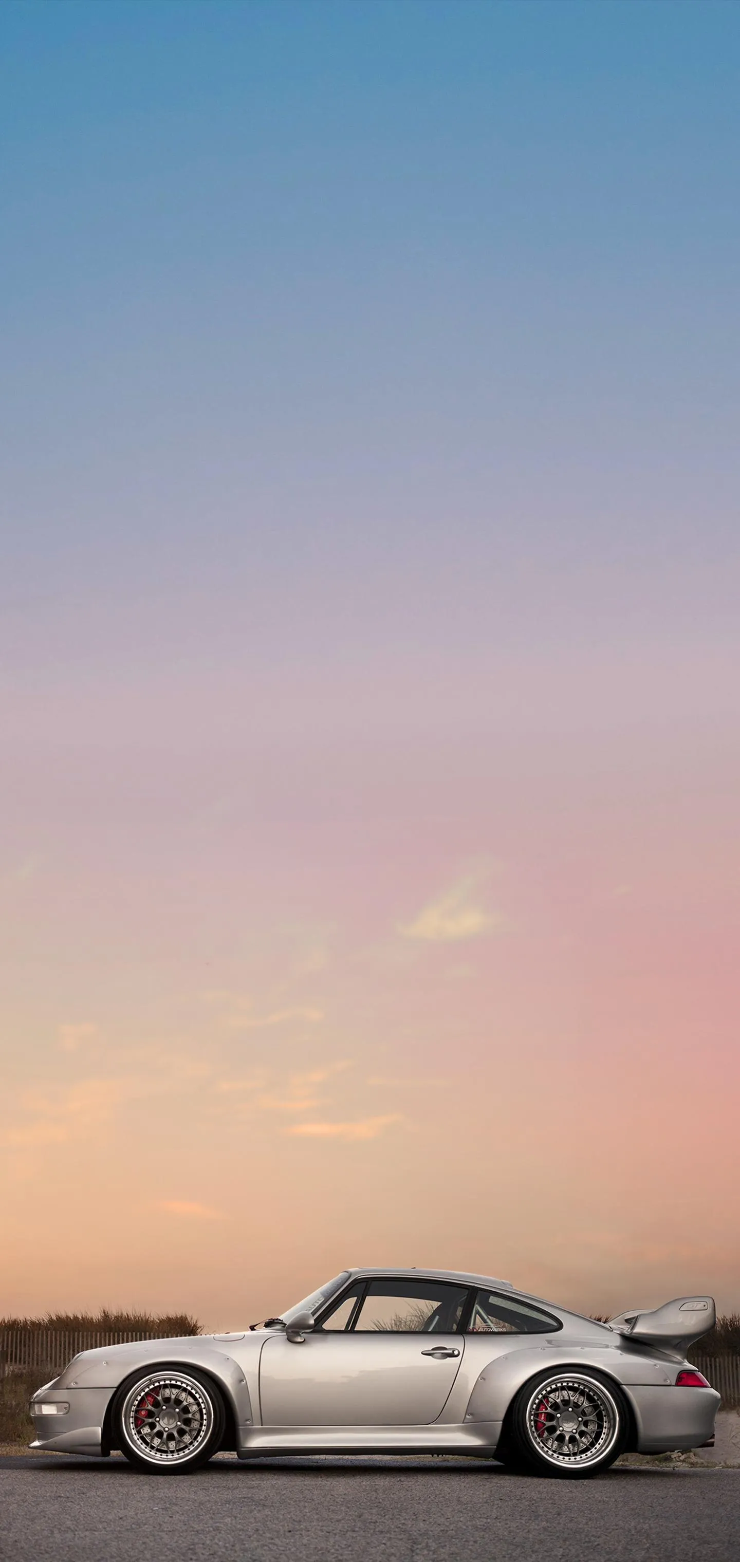 White Sports Car on Desert Sunset Road Wallpaper Background