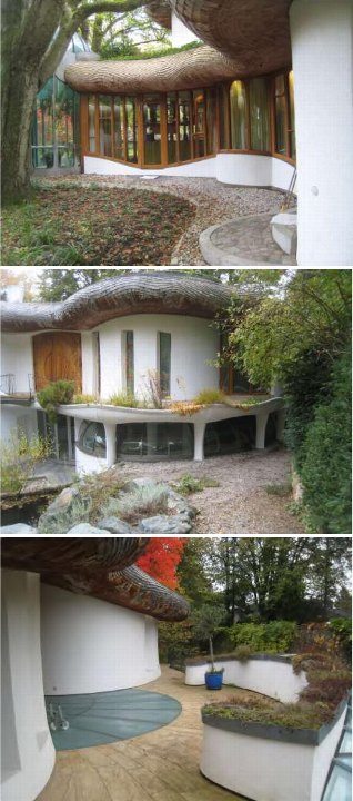 Gartenbereich mit grünen Dächern, Pflanzungen und Natursteinwegen an einem halbrunden Gebäude in Grünwald