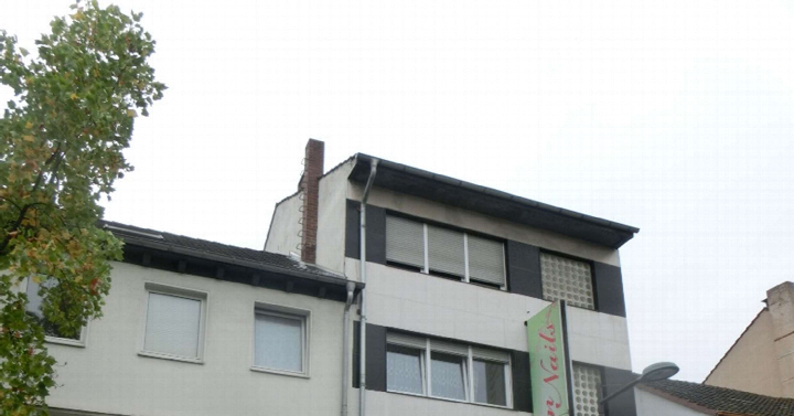 Textseite — Wohn-/Geschäftshaus in Troisdorf