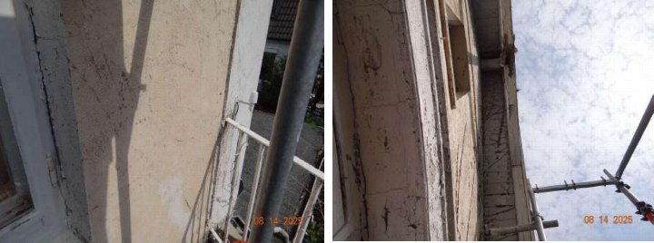 Seitenansicht der Fassade eines Gebäudes mit Rissen und abblätternder Farbe, Metallpfosten und Geländer im Vordergrund, Sicht auf Himmel und Baugerüst
