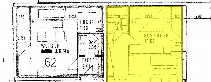 Grundriss einer Eigentumswohnung mit Wohnbereich, Küche, Bad, Schlafzimmer und Diele, inklusive Maßangaben und Flächeninhalten