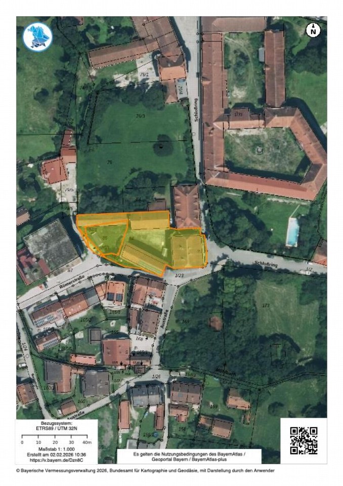Luftbild der Grundstücke am Schloßring in Ering mit markierten Parzellen und Straßenbezeichnungen