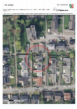 Luftbild der Gudrunstraße 1a in Marl mit markierter Grundstücksfläche, umgeben von Wohnhäusern und Grünflächen