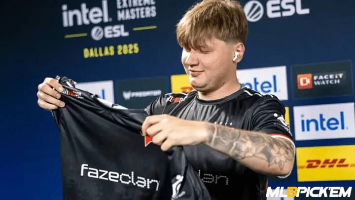 s1mple smiles holding FaZe Clan jersey