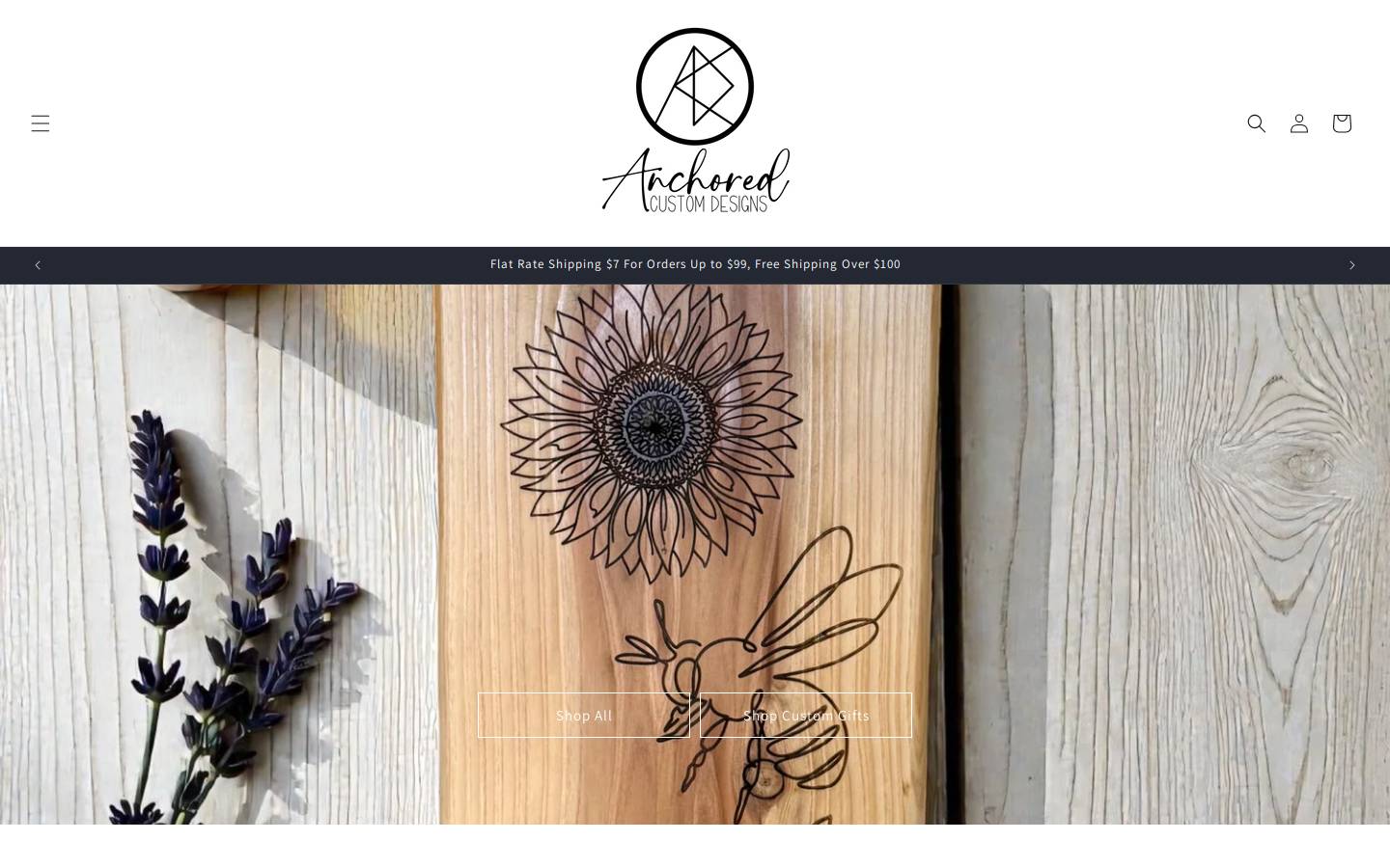 anchoredcustomdesigns.com homepage screenshot