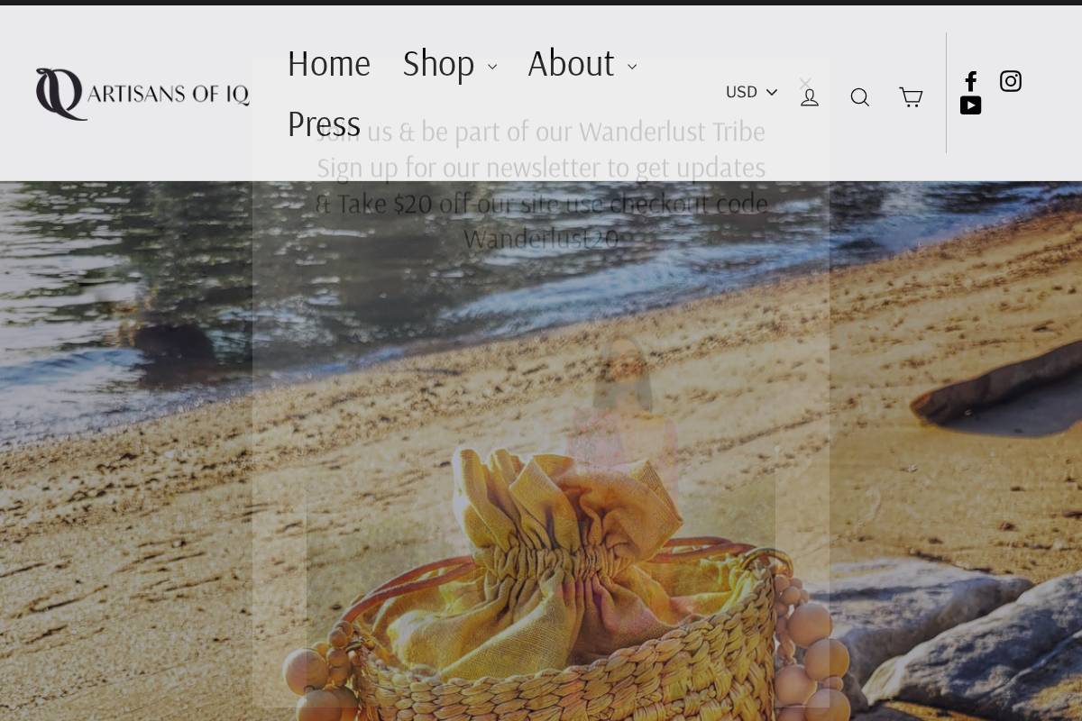 artisansofiq.com homepage screenshot