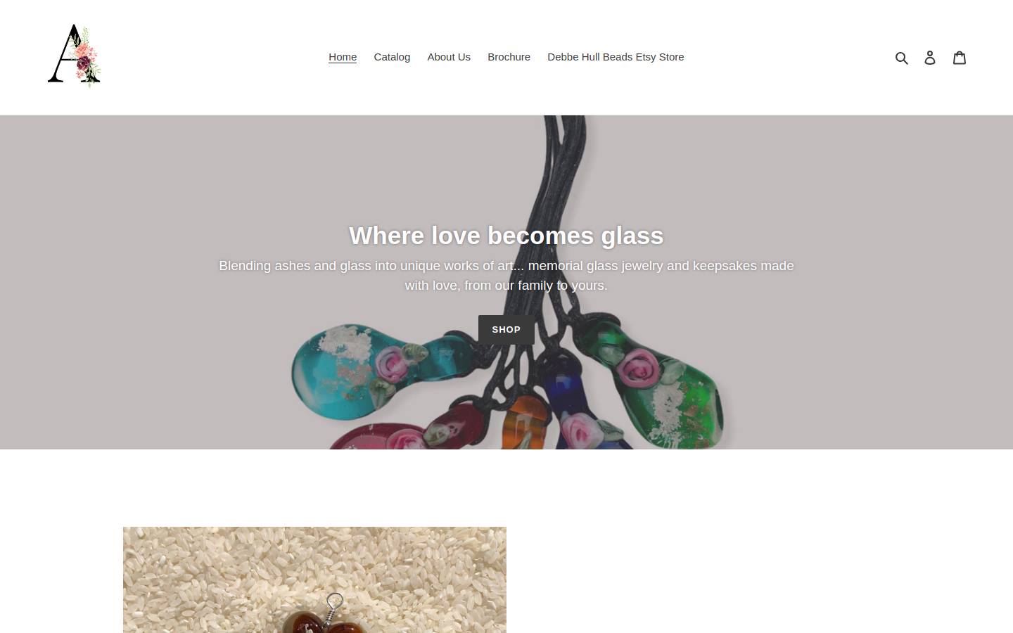 ashestoglass.com homepage screenshot