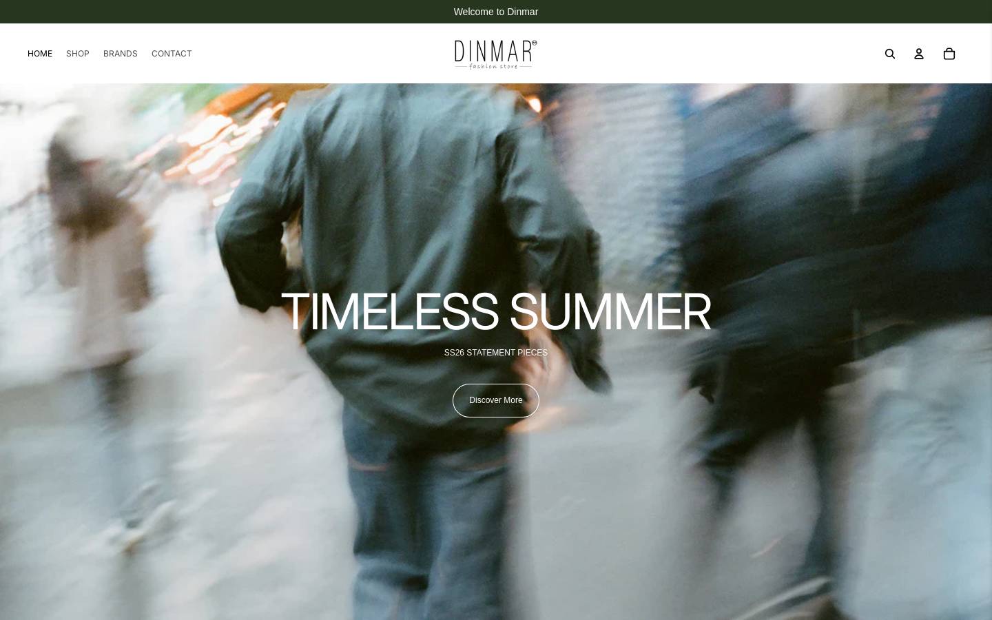 dinmarfashionstore.nl homepage screenshot