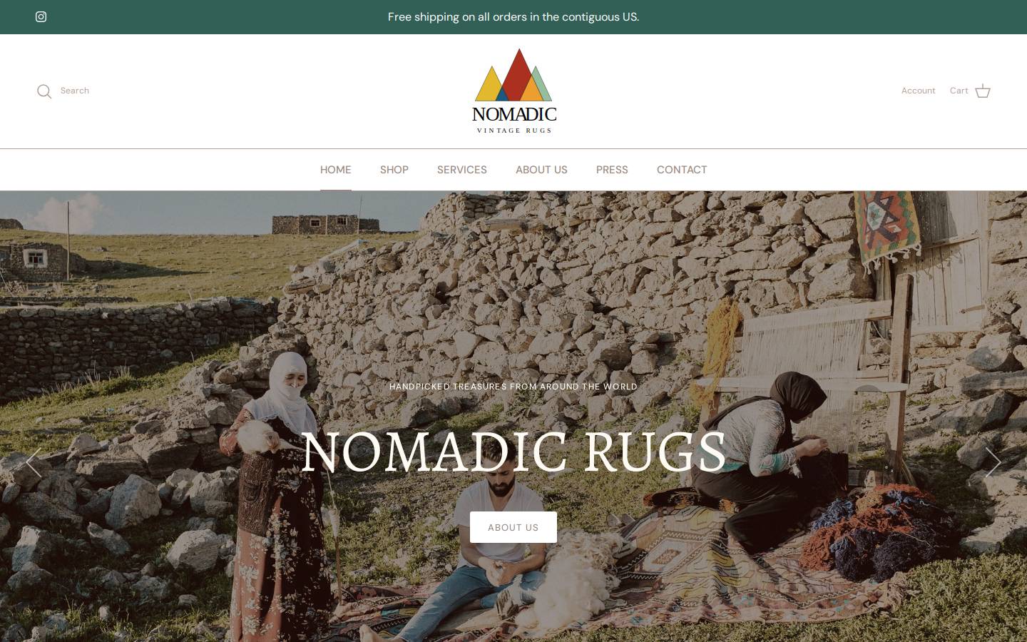 nomadicvintagerugs.com homepage screenshot