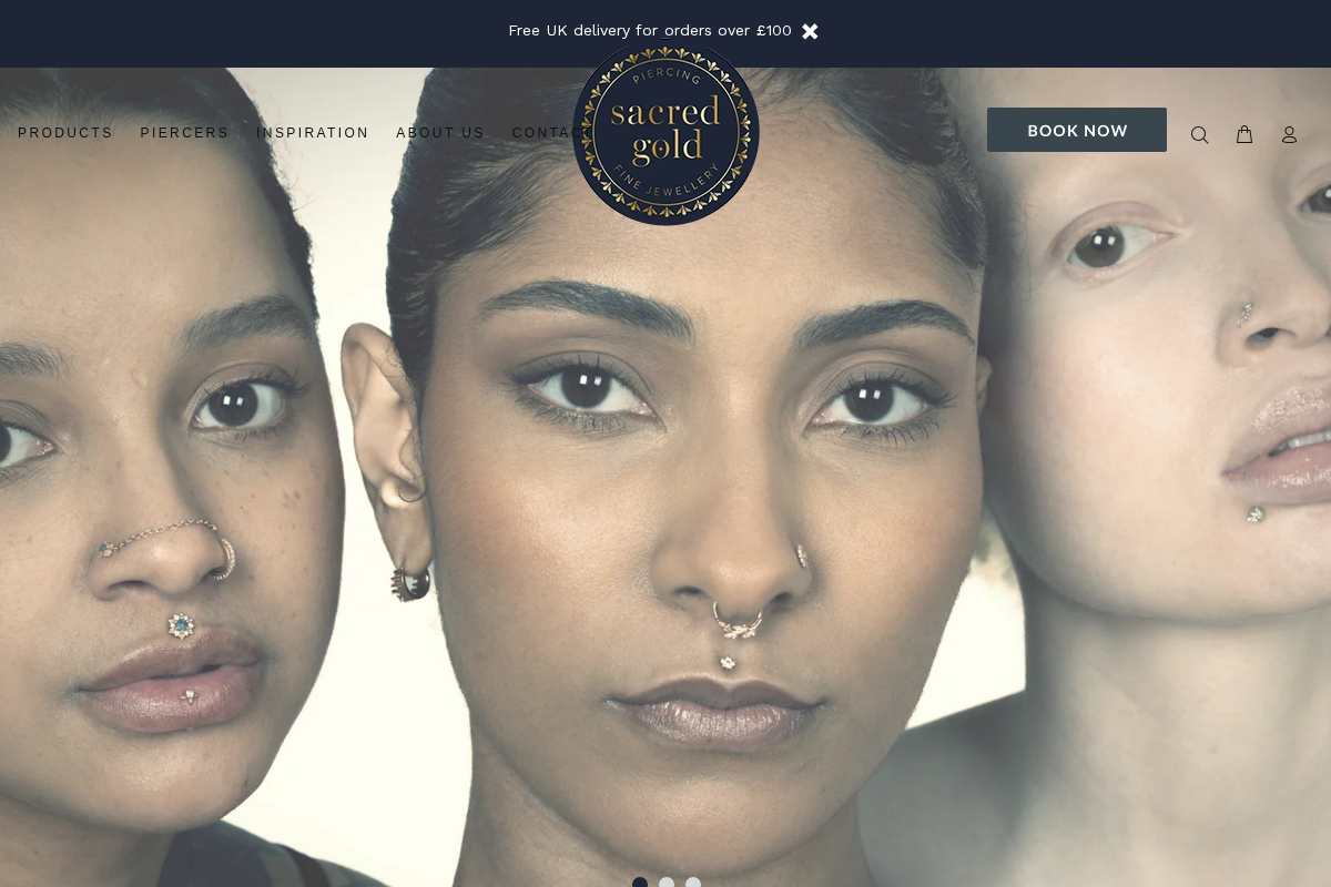 sacredgoldpiercing.com homepage screenshot