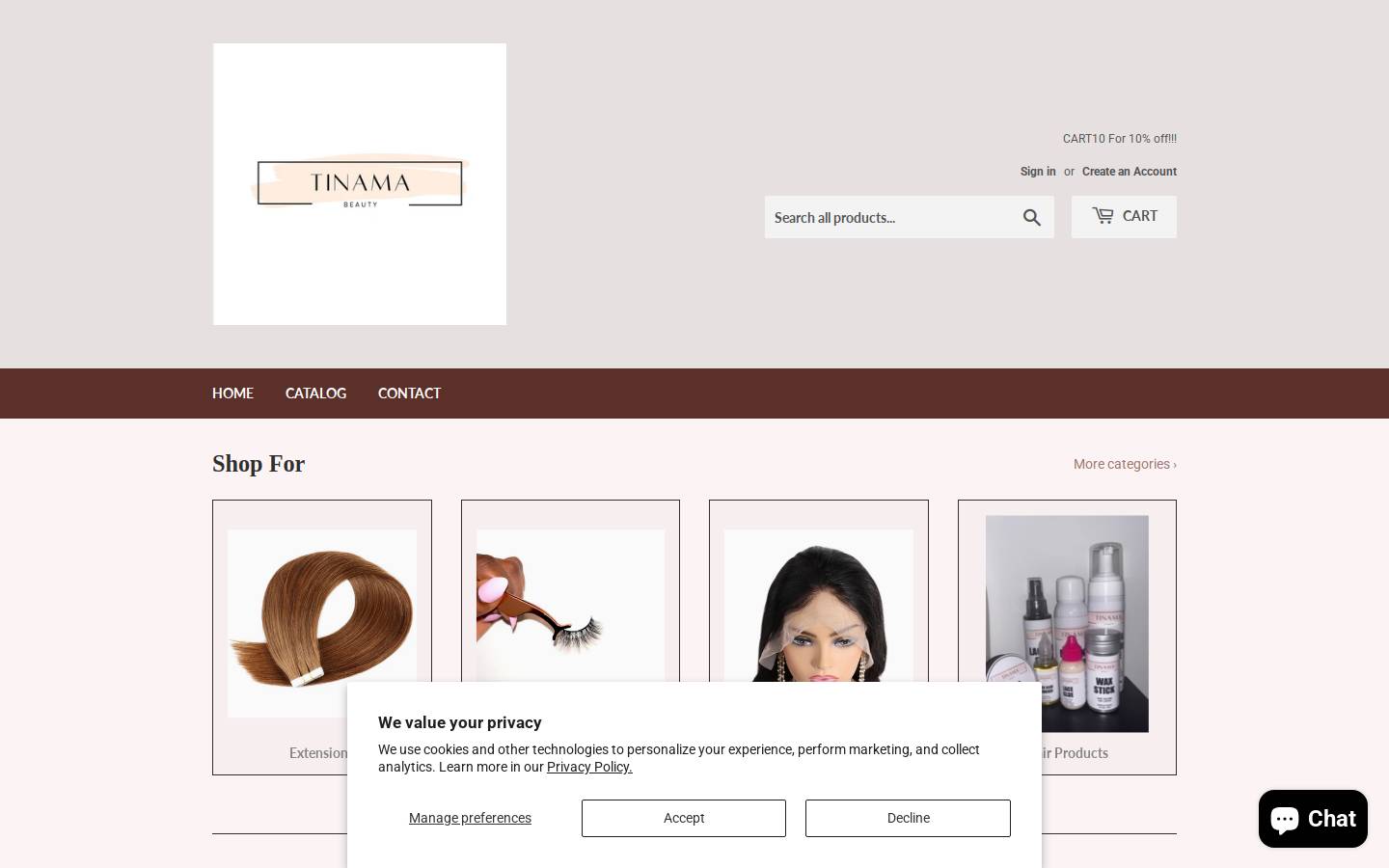 tinamawigs.com homepage screenshot