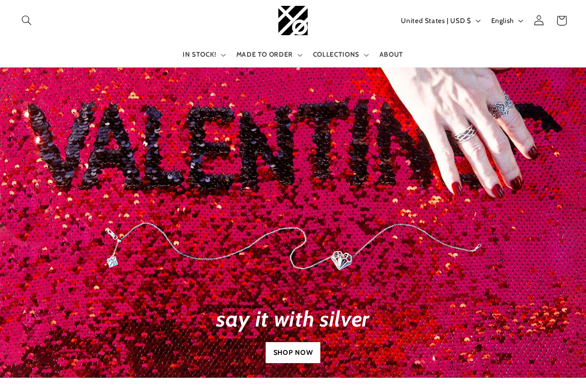 X Over 0 homepage screenshot