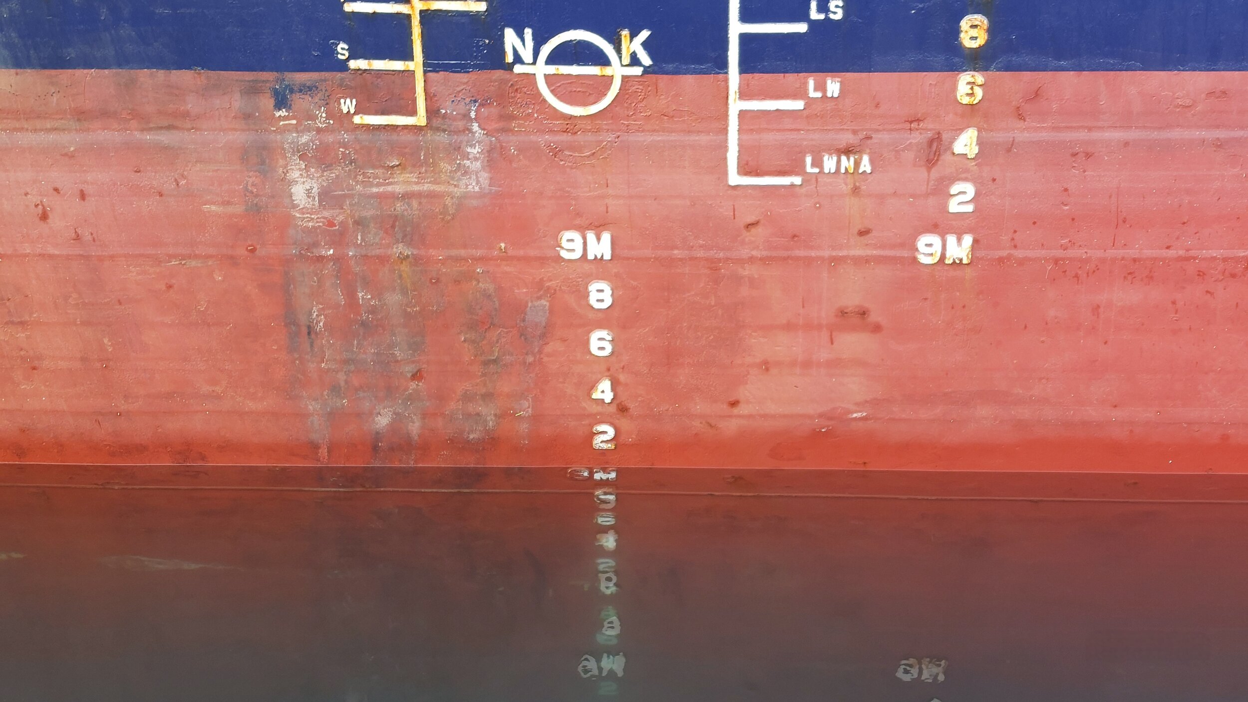 Draught marks at the middle, ship's load line marks