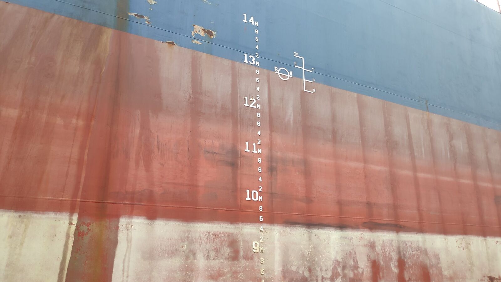 Midship draught marks, condition of load line marks and draught marks